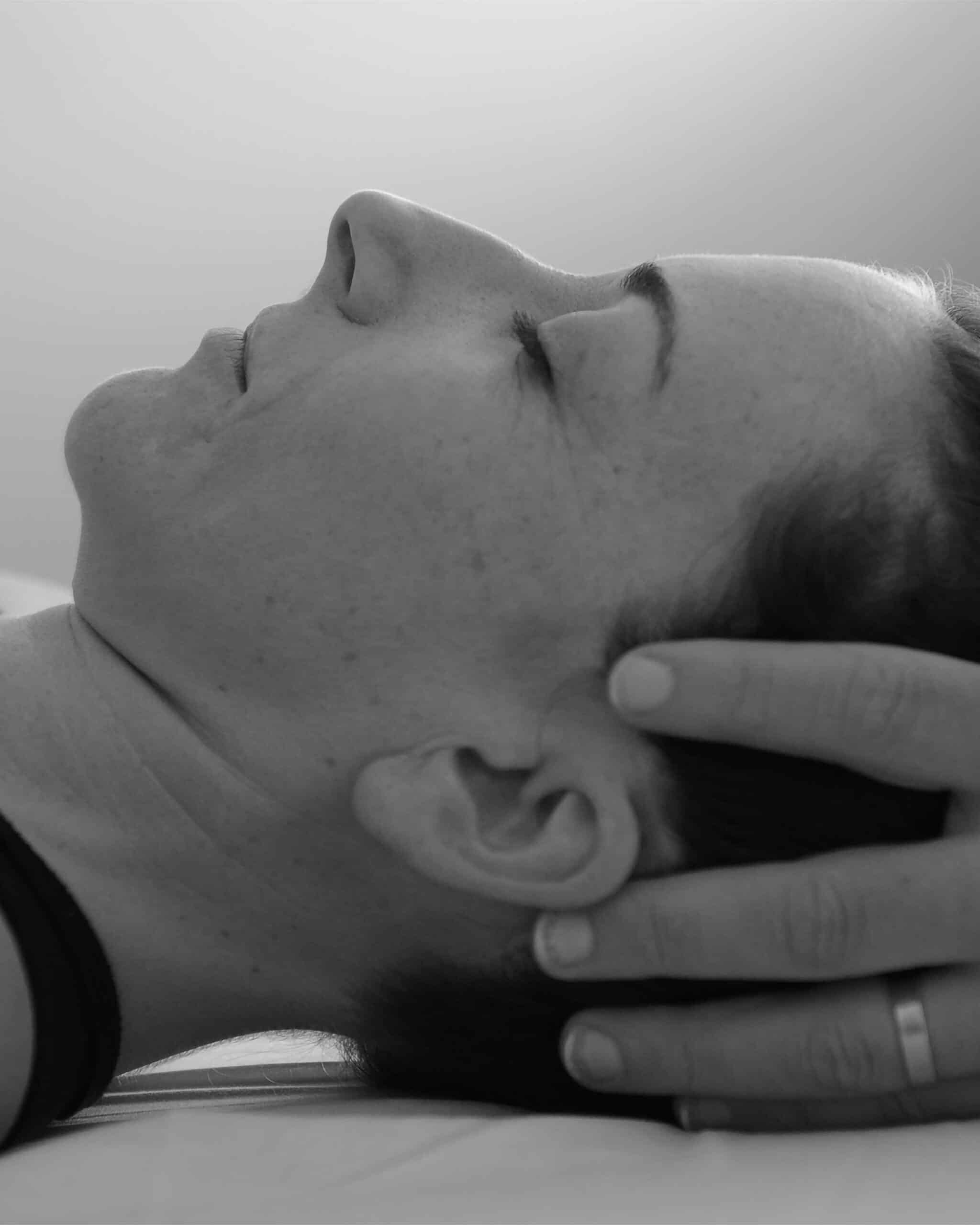 Headshot of a woman getting Rolfing at Bodhi Heart in NYC